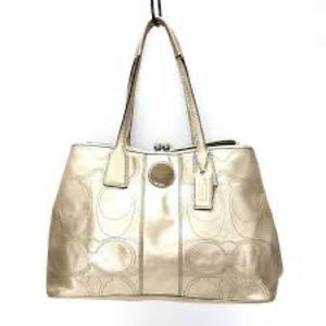 COACH rose gold metallic handbag